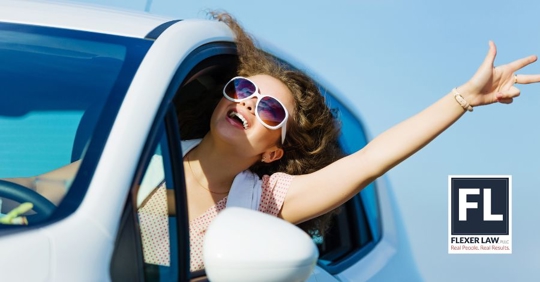 woman driving happily
